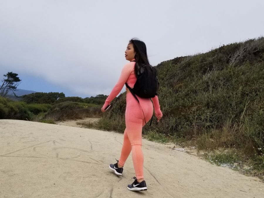 Free porn pics of Hot Asian walking around in tight pink yoga pants at the Beach p 12 of 14 pics