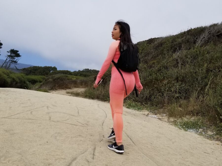 Free porn pics of Hot Asian walking around in tight pink yoga pants at the Beach p 10 of 14 pics