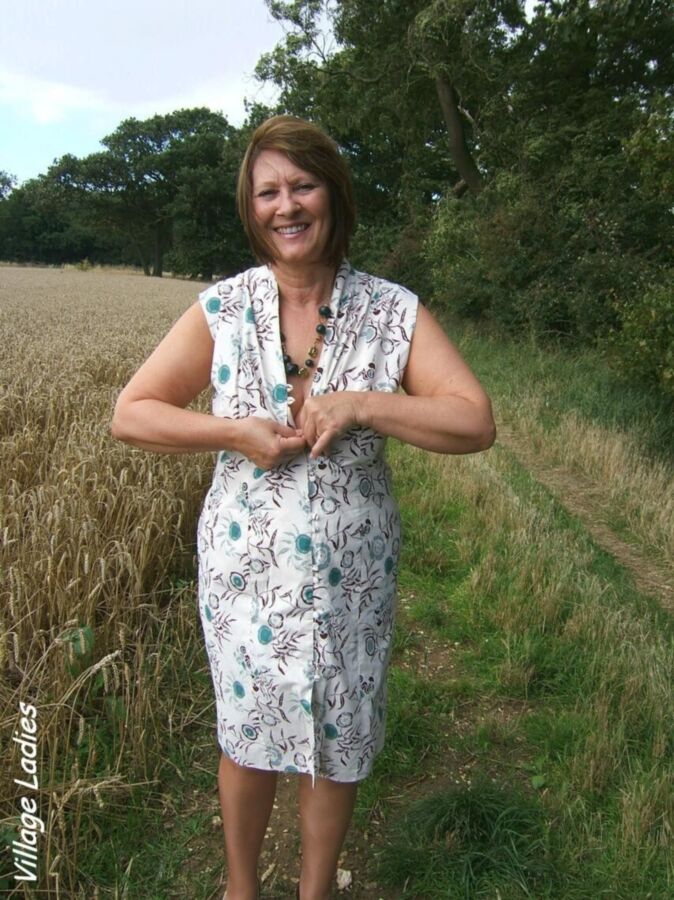 Free porn pics of Kelly flowered dress in the countryside 8 of 83 pics