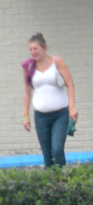 Free porn pics of Super hot big belly streetwalker slut in TIGHT SHIRT BBW 2 of 21 pics