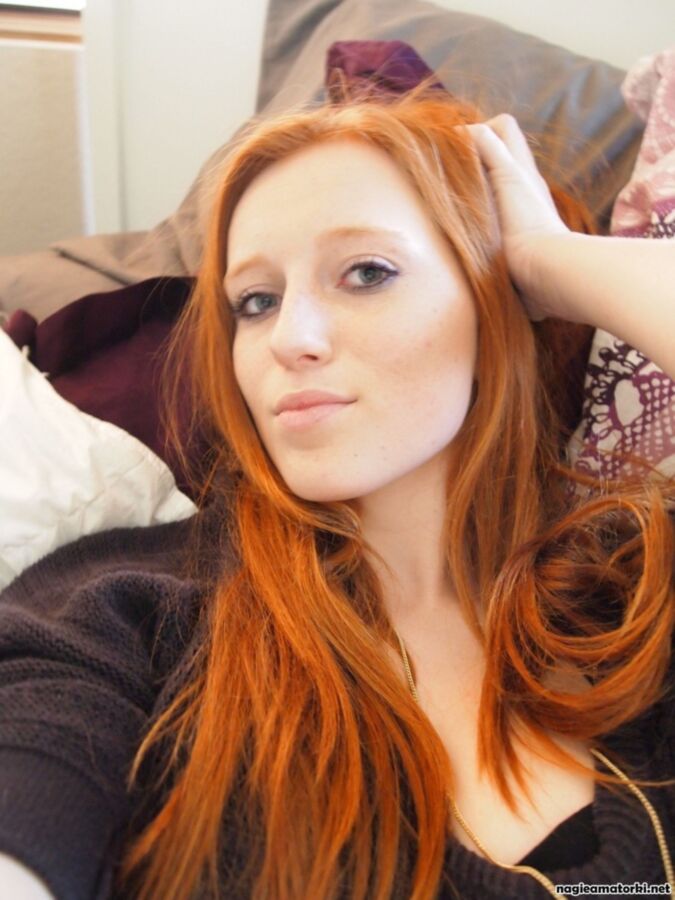 Free porn pics of Amateur redhead teen fingers and vibrates her wet pussy 4 of 59 pics