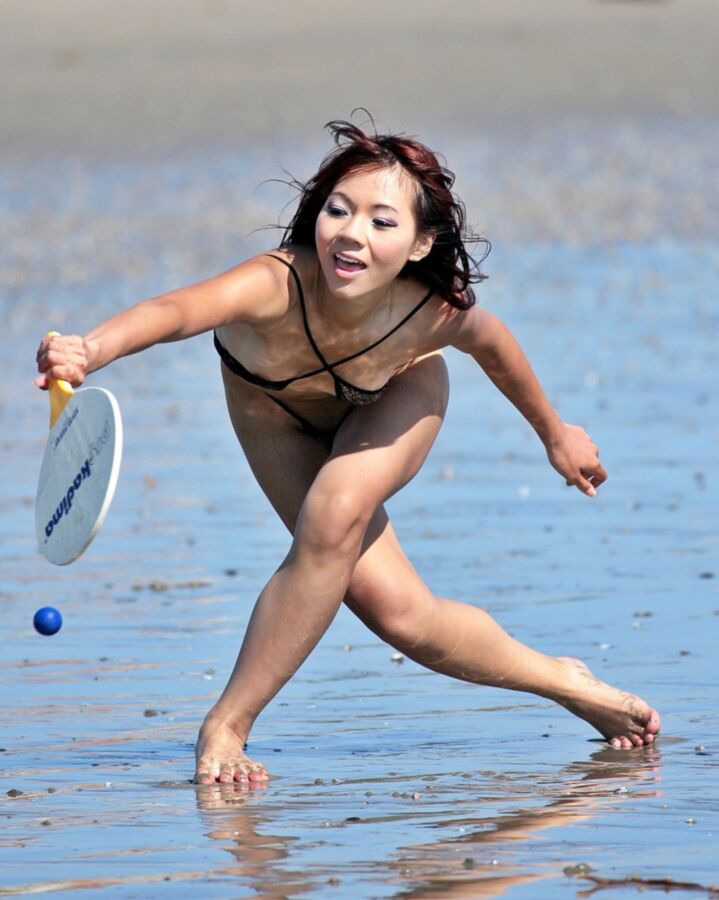 Free porn pics of Young - Amateur - Chinese girl -NN -beach tennis in micro bikini 7 of 14 pics