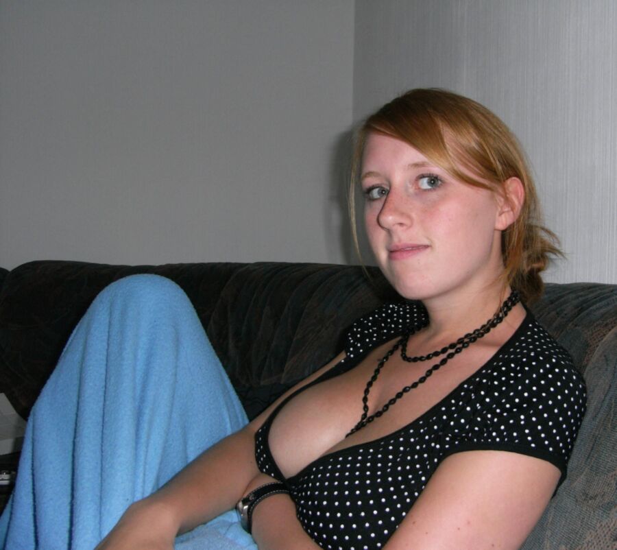 Free porn pics of Well-stacked redhead [almost nonude] 2 of 6 pics
