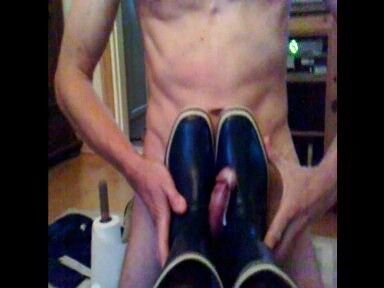 Free porn pics of He cumming on rubberboots 1 of 16 pics
