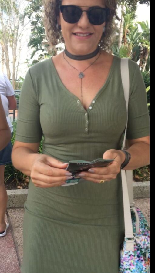 Free porn pics of Sexy Fit Candid Milf in Tight Green Dress 10 of 16 pics