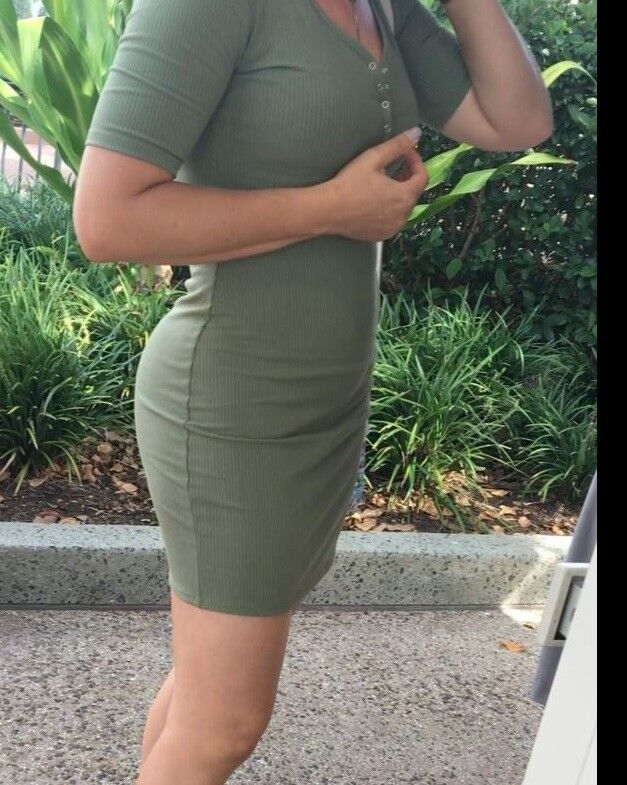 Free porn pics of Sexy Fit Candid Milf in Tight Green Dress 2 of 16 pics