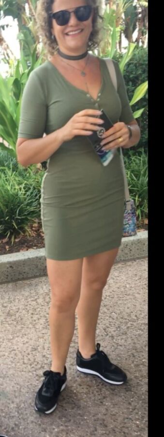 Free porn pics of Sexy Fit Candid Milf in Tight Green Dress 8 of 16 pics
