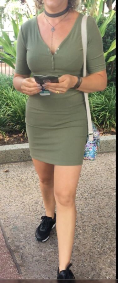 Free porn pics of Sexy Fit Candid Milf in Tight Green Dress 9 of 16 pics
