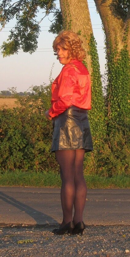 Free porn pics of Nicola in Red Blouse & Black PVC Skirt 9 of 19 pics
