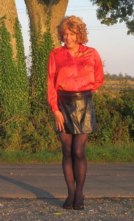 Free porn pics of Nicola in Red Blouse & Black PVC Skirt 7 of 19 pics