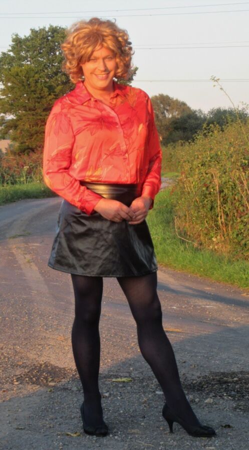 Free porn pics of Nicola in Red Blouse & Black PVC Skirt 13 of 19 pics