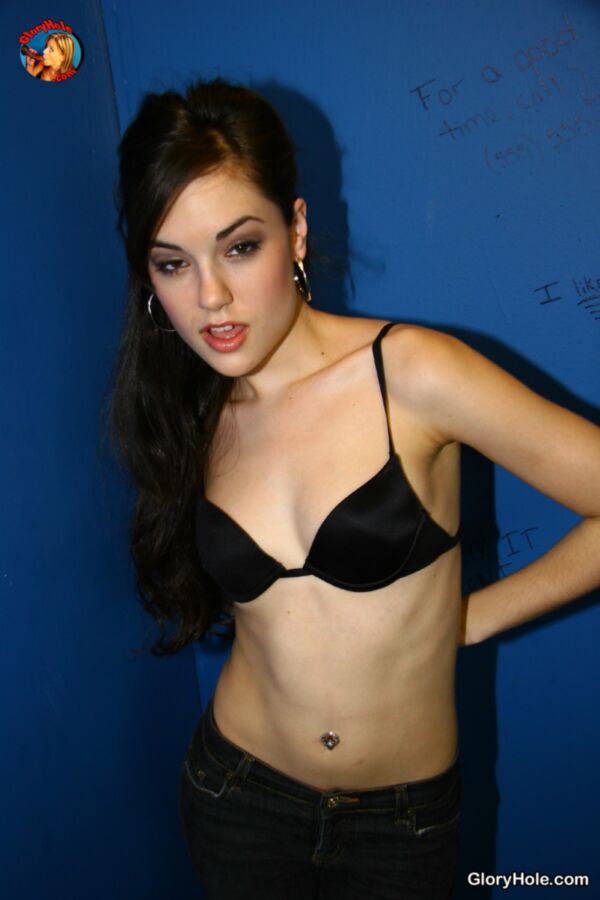 Free porn pics of Sasha Grey going to work in a glory hole 20 of 157 pics
