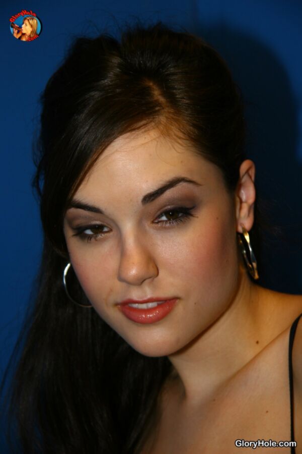 Free porn pics of Sasha Grey going to work in a glory hole 16 of 157 pics