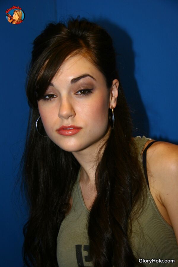 Free porn pics of Sasha Grey going to work in a glory hole 7 of 157 pics