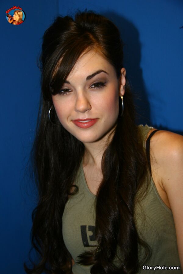 Free porn pics of Sasha Grey going to work in a glory hole 5 of 157 pics