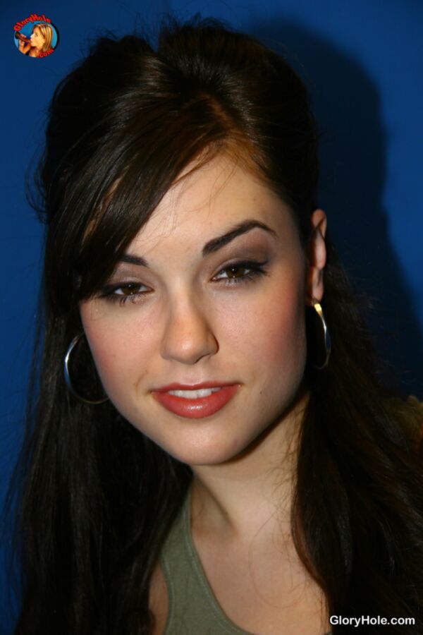 Free porn pics of Sasha Grey going to work in a glory hole 4 of 157 pics