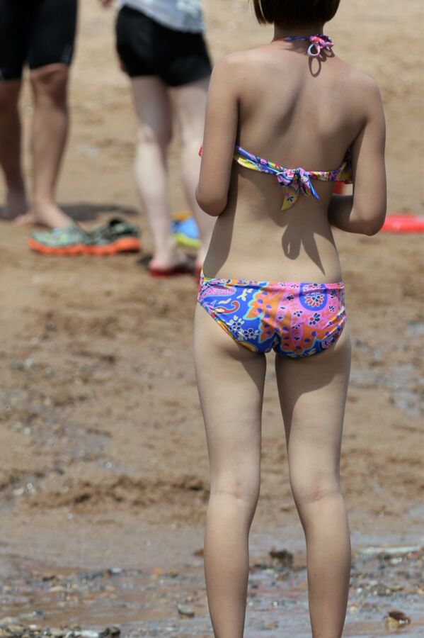 Free porn pics of Candid: Sexy Chinese beach ass..... 13 of 40 pics