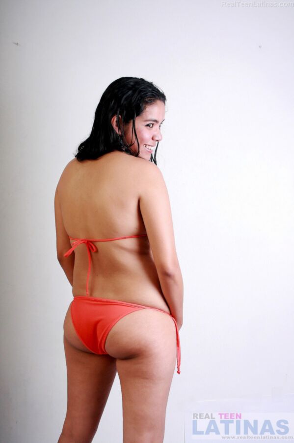 Free porn pics of Hairy Latina lorena in her orange bikini 4 of 15 pics