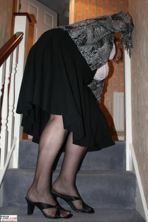 Free porn pics of Chubby mature Claire posing at the top of her stairway. 2 of 69 pics