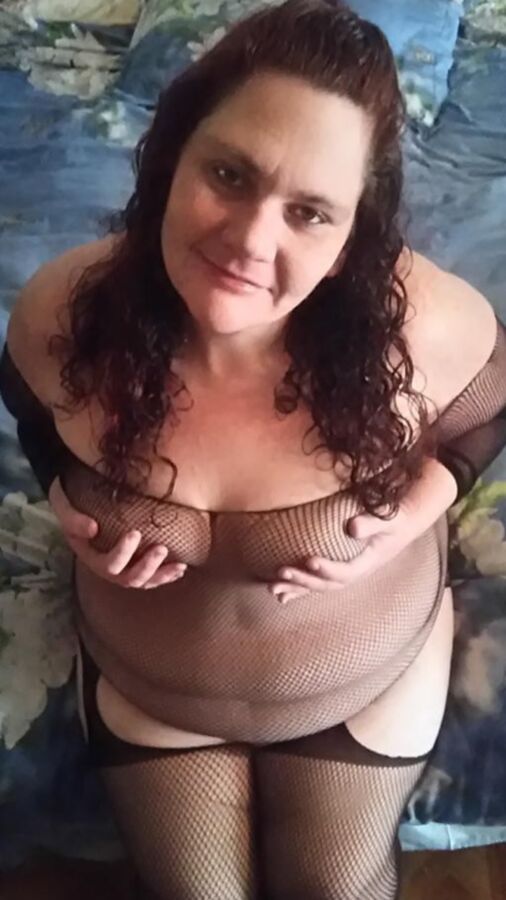 Free porn pics of Darkly hot BBW chunky escort with rolls and thickness 7 of 14 pics