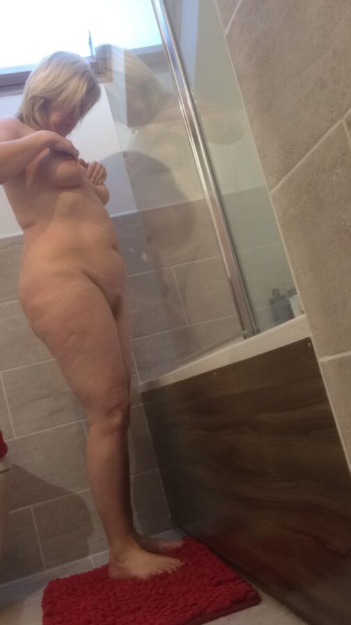 Free porn pics of My wife taking a shower 22 of 53 pics