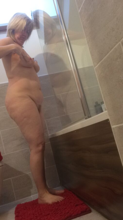 Free porn pics of My wife taking a shower 15 of 53 pics