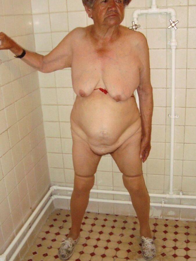 Free porn pics of Latina/Latino Granny under the shower 1 of 16 pics