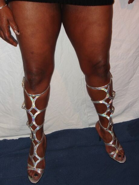 Free porn pics of UK EBONY GRANNY SHOWS OF STRONG LEGS & HAIRY PUSSY 2 of 17 pics