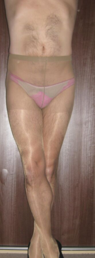 Free porn pics of Pink panties and sheer tan tights 7 of 24 pics