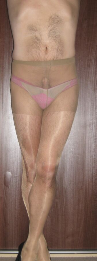 Free porn pics of Pink panties and sheer tan tights 10 of 24 pics