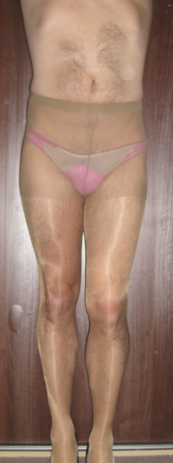 Free porn pics of Pink panties and sheer tan tights 1 of 24 pics