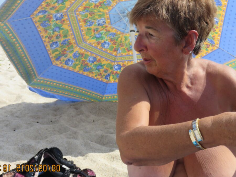 Free porn pics of Would love eat this hairy granny out - on the beach 18 of 22 pics