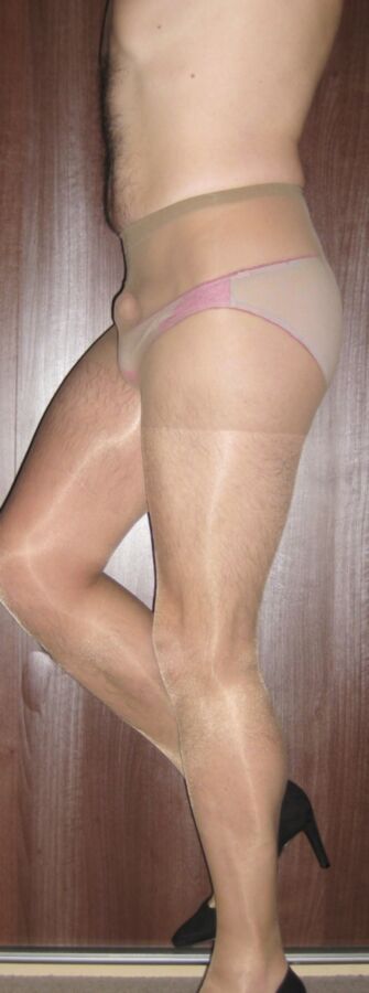 Free porn pics of Pink panties and sheer tan tights 15 of 24 pics