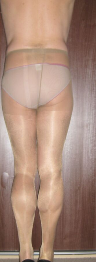 Free porn pics of Pink panties and sheer tan tights 3 of 24 pics