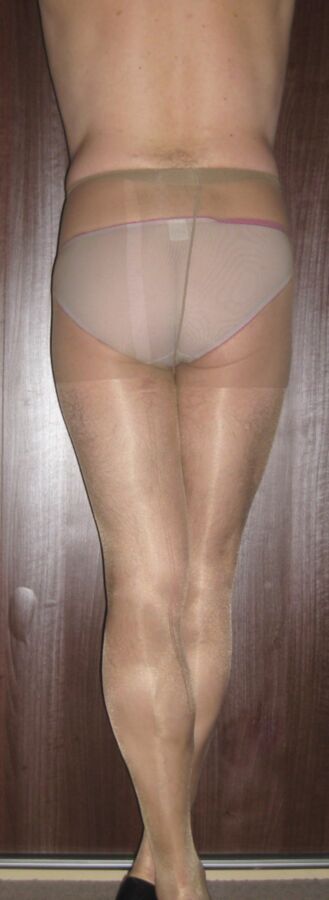 Free porn pics of Pink panties and sheer tan tights 4 of 24 pics