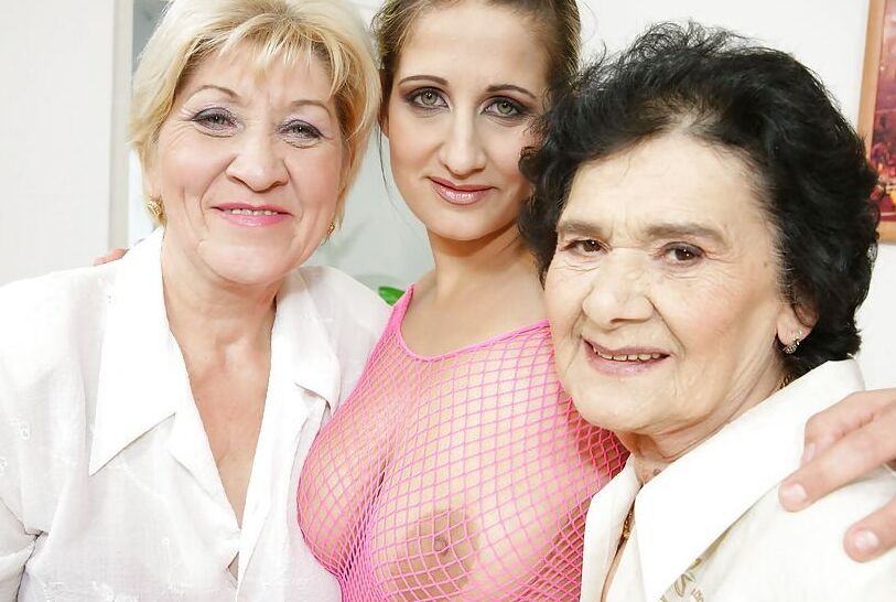 Free porn pics of Two old grannies fuck lesbian girl in fishnet dress 2 of 67 pics