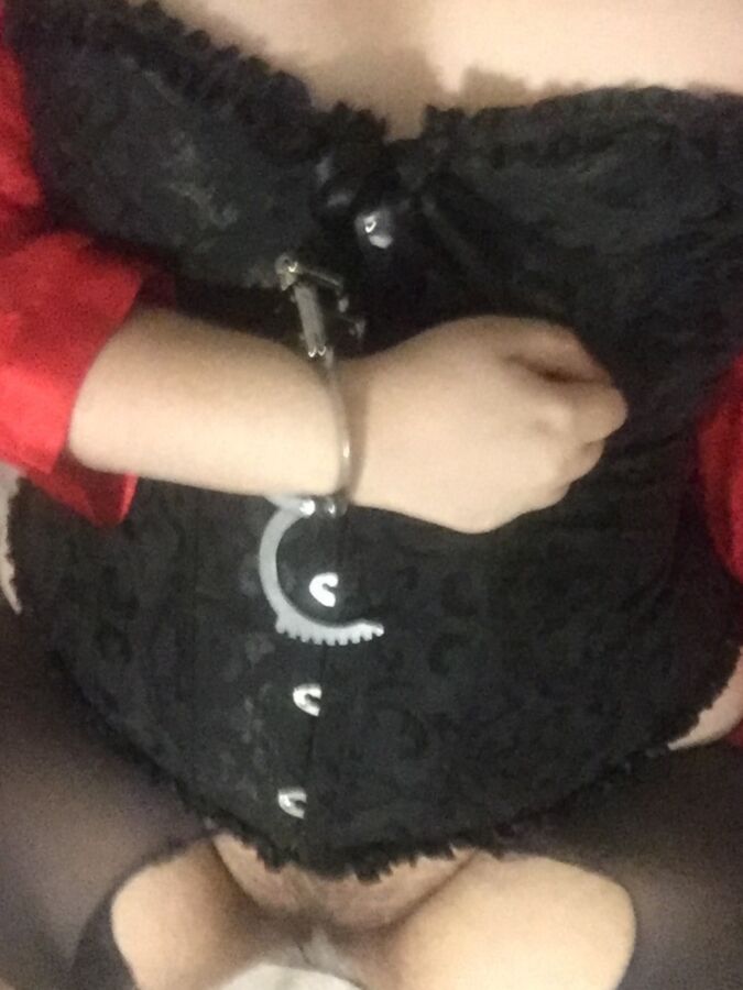 Free porn pics of Slut in corset and bondage 4 of 20 pics