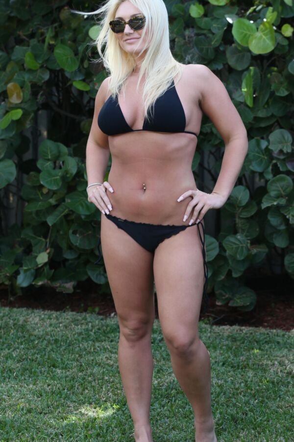 Free porn pics of Brooke Hogan - Busty Babe in Tiny Black Bikini Poolside in Miami 3 of 65 pics