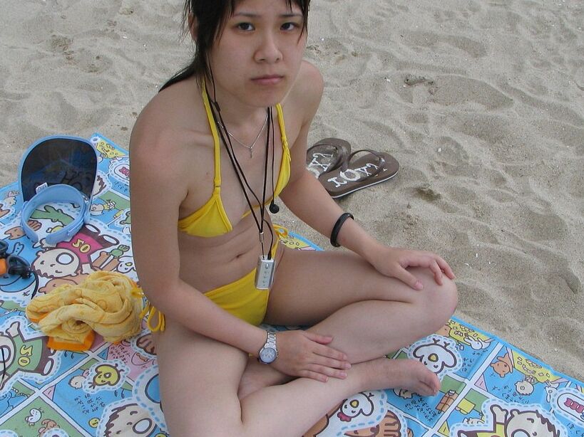Free porn pics of Hot asian teen nude at home and at the beach 16 of 49 pics