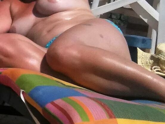 Free porn pics of My wife sunbathing topless 5 of 5 pics