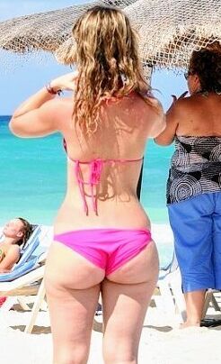 Free porn pics of juicy ass in pink on beach 3 of 7 pics