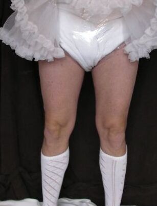 Free porn pics of Peter Went diapered sissy in pretty frilly skirt and kneesocks 6 of 15 pics