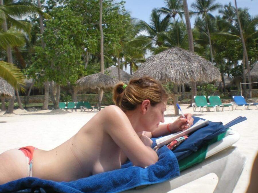 Free porn pics of Mature Saggy woman topless beach 6 of 17 pics