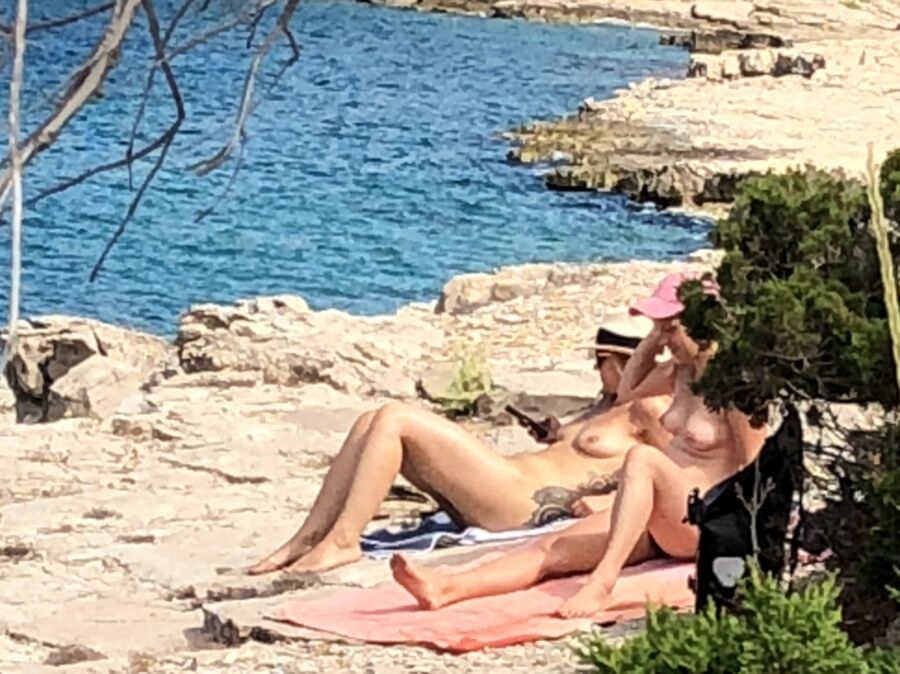 Free porn pics of naked lesbians on the beach 3 of 34 pics