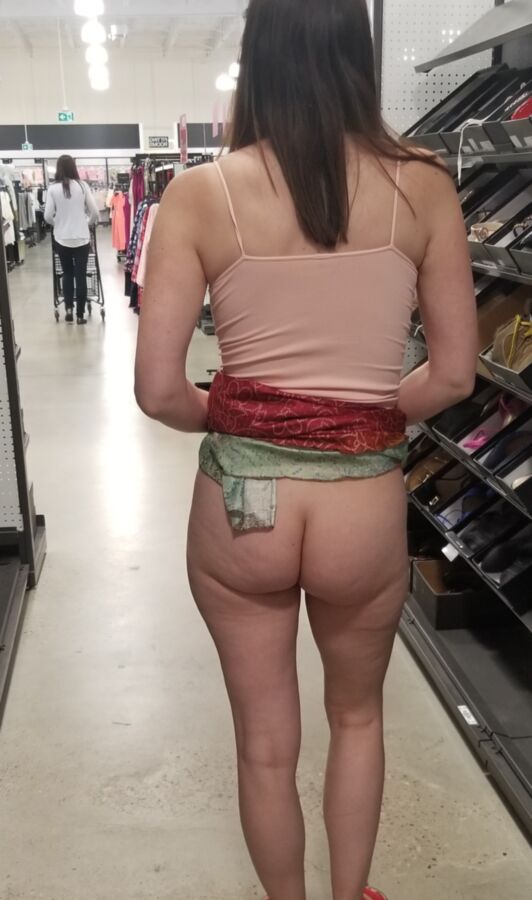 Free porn pics of Wife flashing pussy with no panties in shoe store 15 of 16 pics