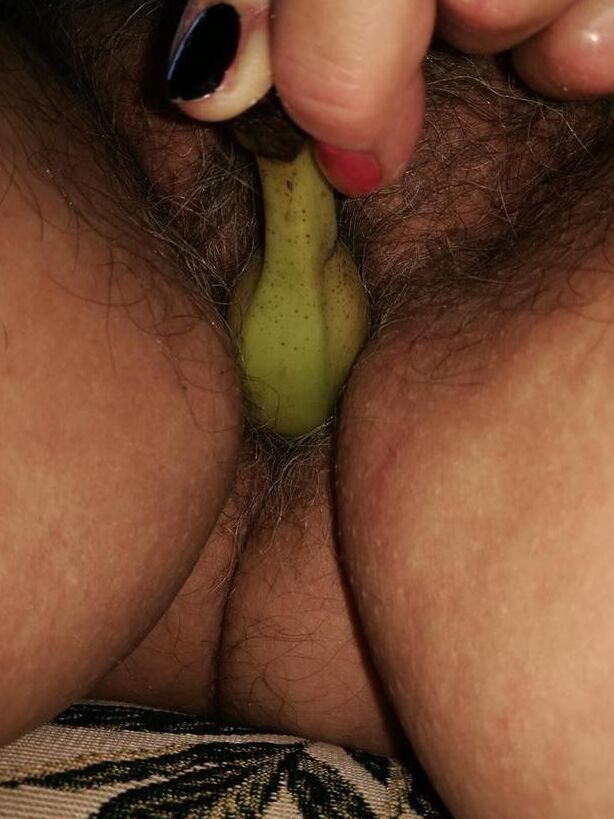 Free porn pics of Horny granny Caro sticks a banana inside her natural pussy  17 of 18 pics