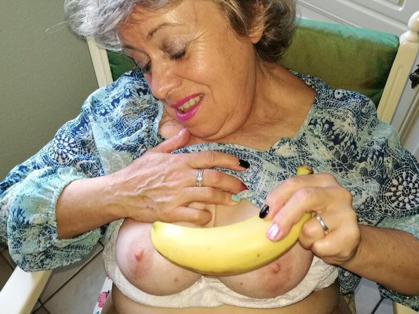 Free porn pics of Horny granny Caro sticks a banana inside her natural pussy  2 of 18 pics