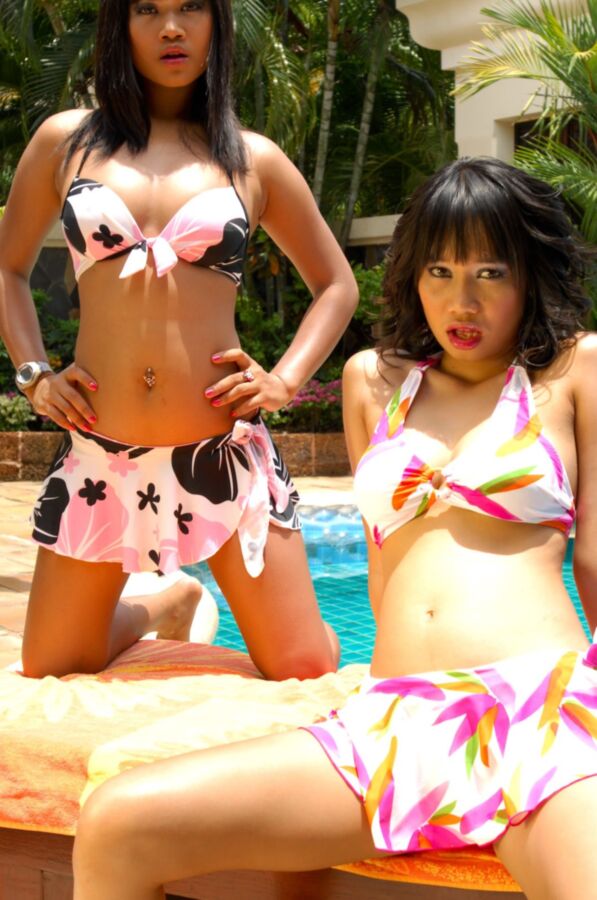 Free porn pics of Kanda Kan and Nicha Hot Asians by the Pool 14 of 25 pics