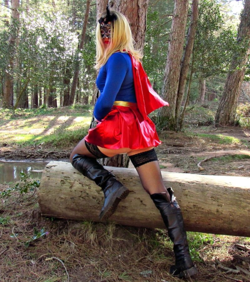 Free porn pics of Sexy Superwoman in stockings and boots, without panties cosplay  4 of 19 pics