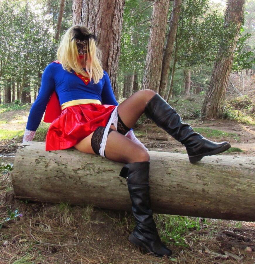 Free porn pics of Sexy Superwoman in stockings and boots, without panties cosplay  12 of 19 pics